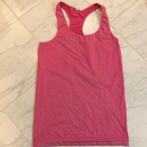 Under armour pink tank top. Heat gear.